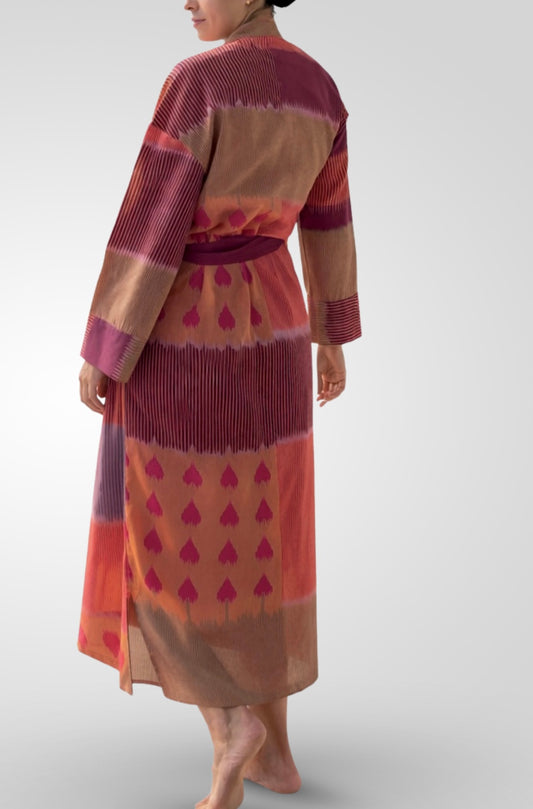 100% cotton ikat long kimono in pink, purple, orange, and brown, handloom fabric, with belt and tassel, back view, women’s loungewear