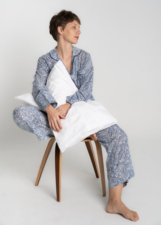 Blue-white small pattern 100% Indian cotton women’s pyjama set with shirt and long pants, oversized fit, light and breathable, front view, hugging pillow